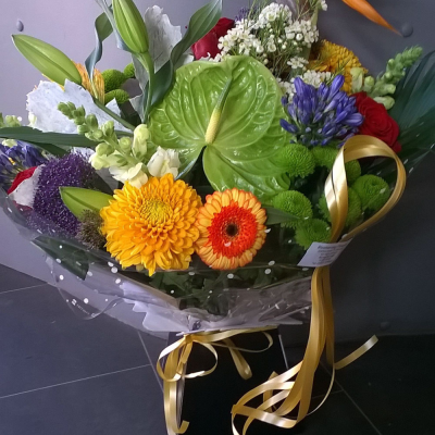 Sunrise - Energise their day with a stunning surprise. A warm collection of seasonal flowers artistically arranged by an artistic florist. Available for same day delivery when ordered before 2pm.